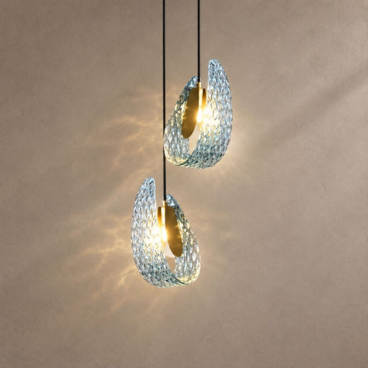 PAVO (PENDANT) lighting on a mushroom taupe background with natural shadows