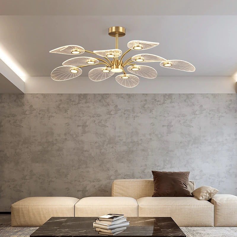 ORVIAN petal ceiling light, lit, above a cream sofa in a living room