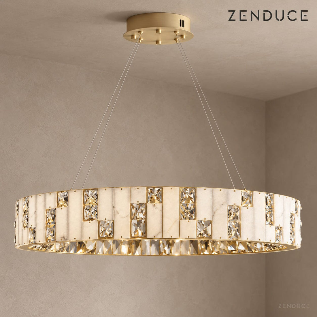 CEREN alabaster and crystal drum chandelier in Brushed Gold against a taupe architectural background