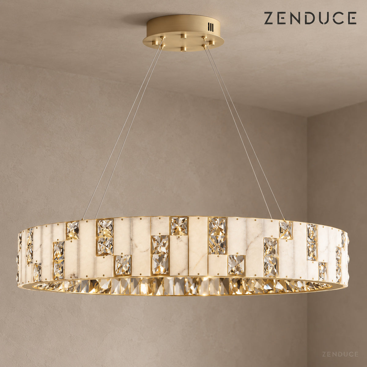 CEREN alabaster and crystal drum chandelier in Brushed Gold against a taupe architectural background
