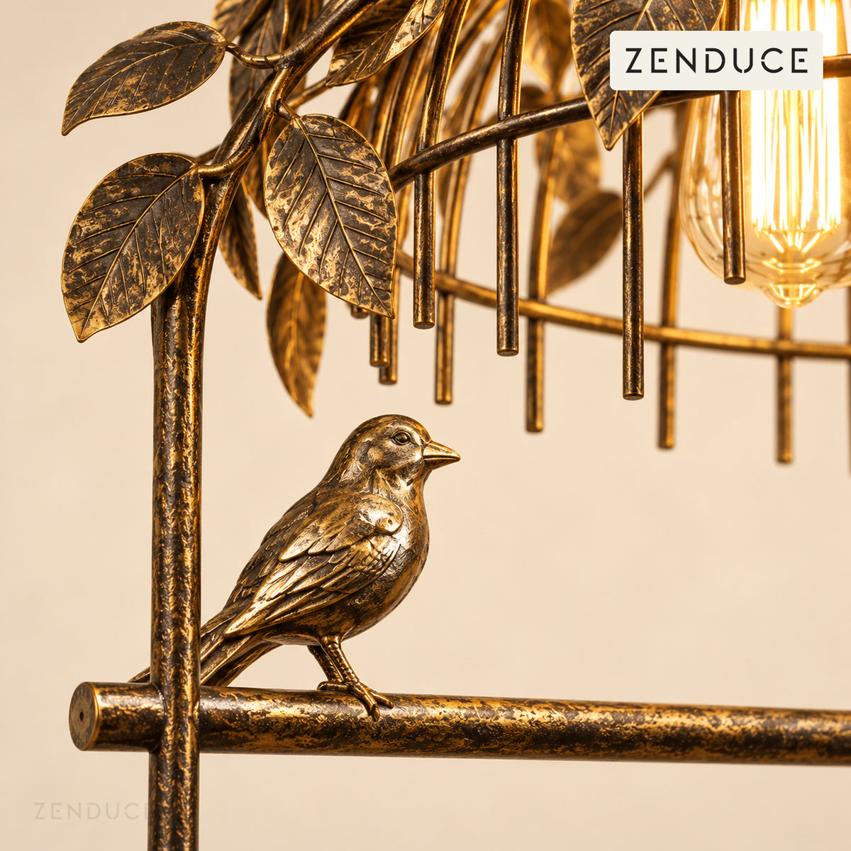 AVETTA Gold metal bird, textured perch and veined leaf detail