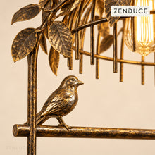 AVETTA Gold metal bird, textured perch and veined leaf detail