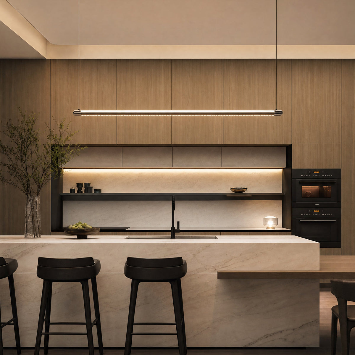 Medium-width NOXVARE linear pendant isolated with chrome end caps and slim suspension wires.
