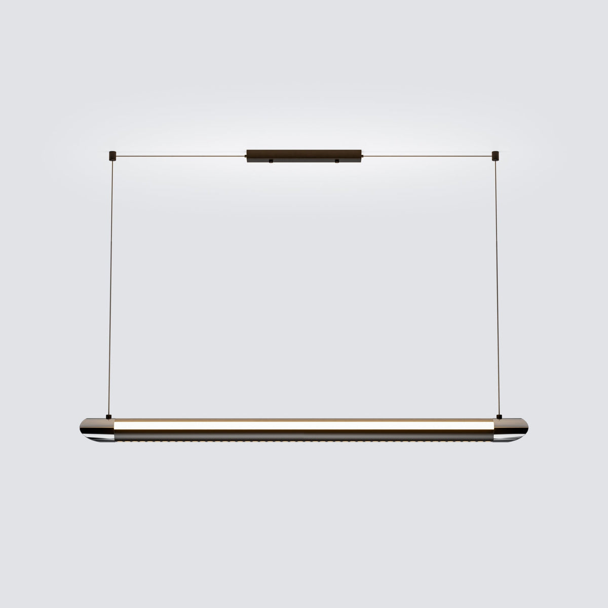 NOXVARE pendant suspended above a dark dining table in a warm wood-toned interior.