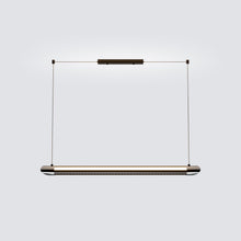 NOXVARE glossy-black linear pendant isolated at an angle with chrome end caps and twin diffusers.