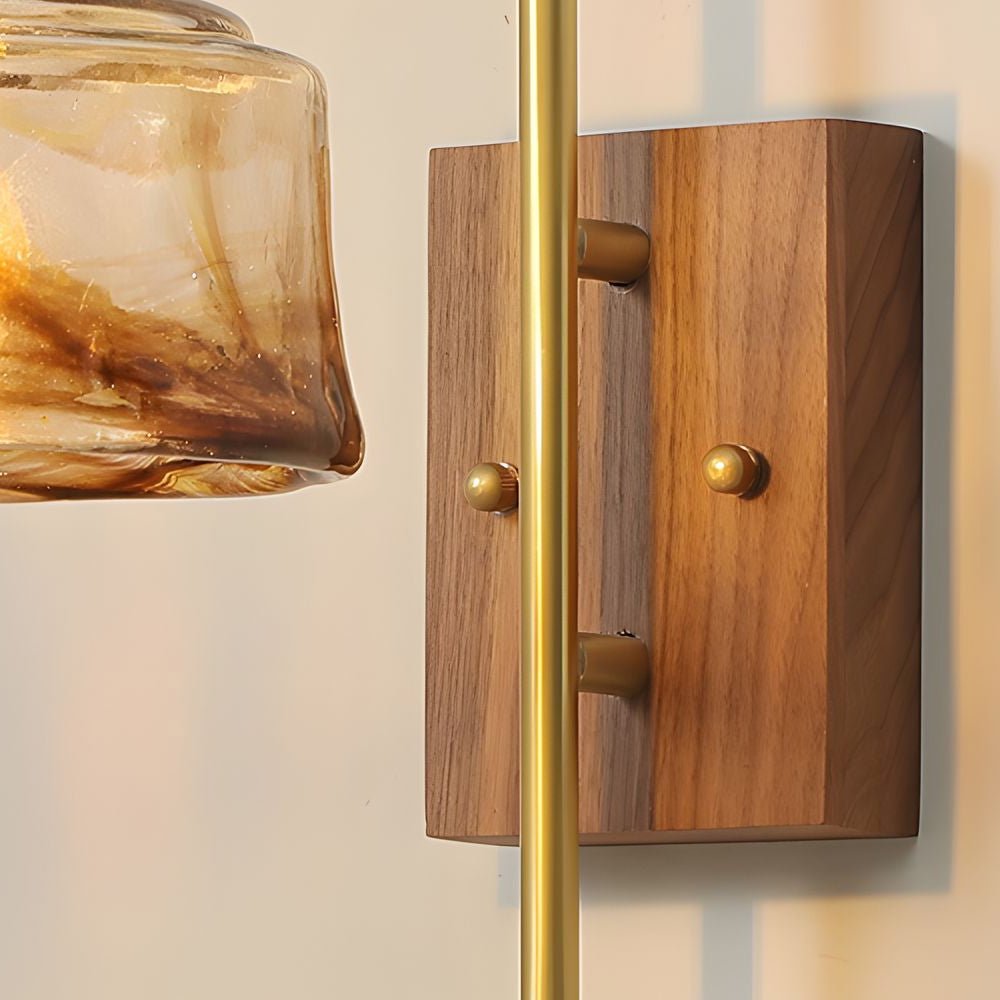 ARLETTE - Close view of the walnut mounting block and brass hardware