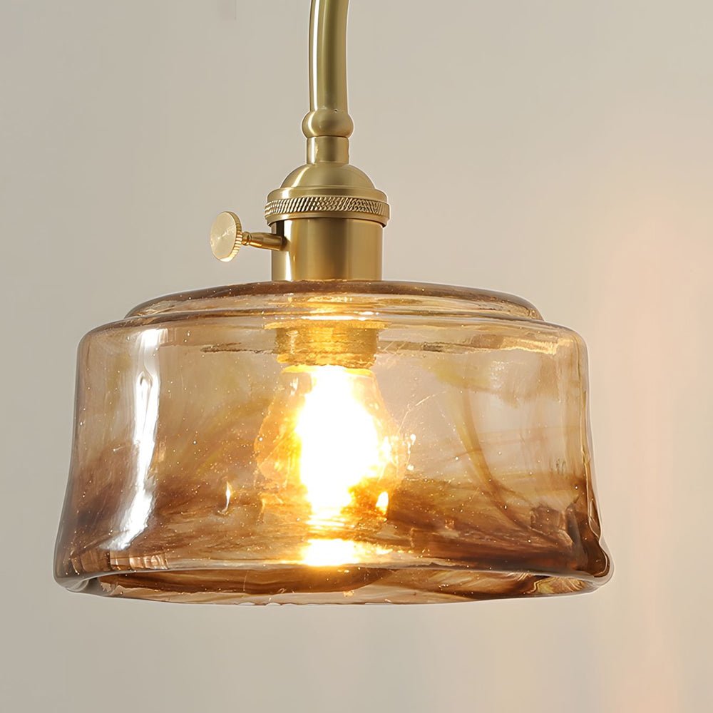 ARLETTE - Close view of the amber round rippled glass shade