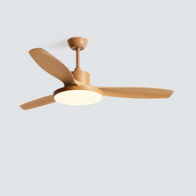 SKAGEN light-wood five-blade ceiling fan isolated with its round center light switched on.