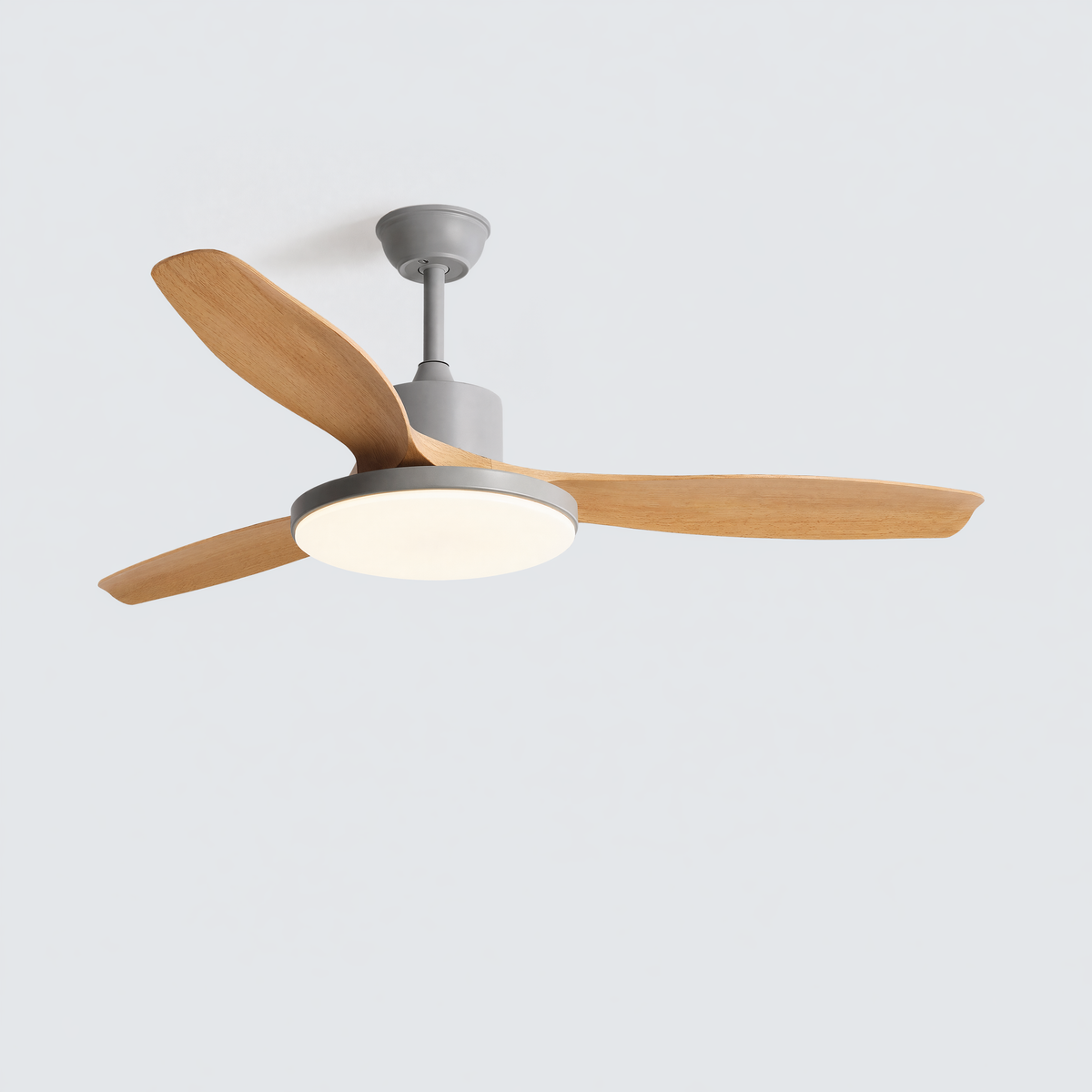 Green SKAGEN ceiling fan with wood blades installed on a covered garden patio.