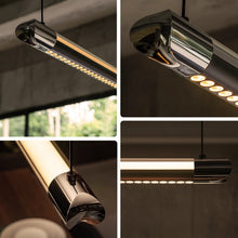 Long NOXVARE black pendant isolated front-on with a narrow matching ceiling canopy.
