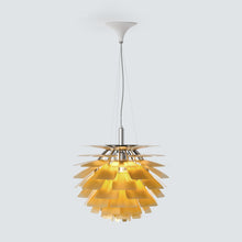 SYLUNE layered metal pine-cone chandelier isolated in a brass-toned finish.