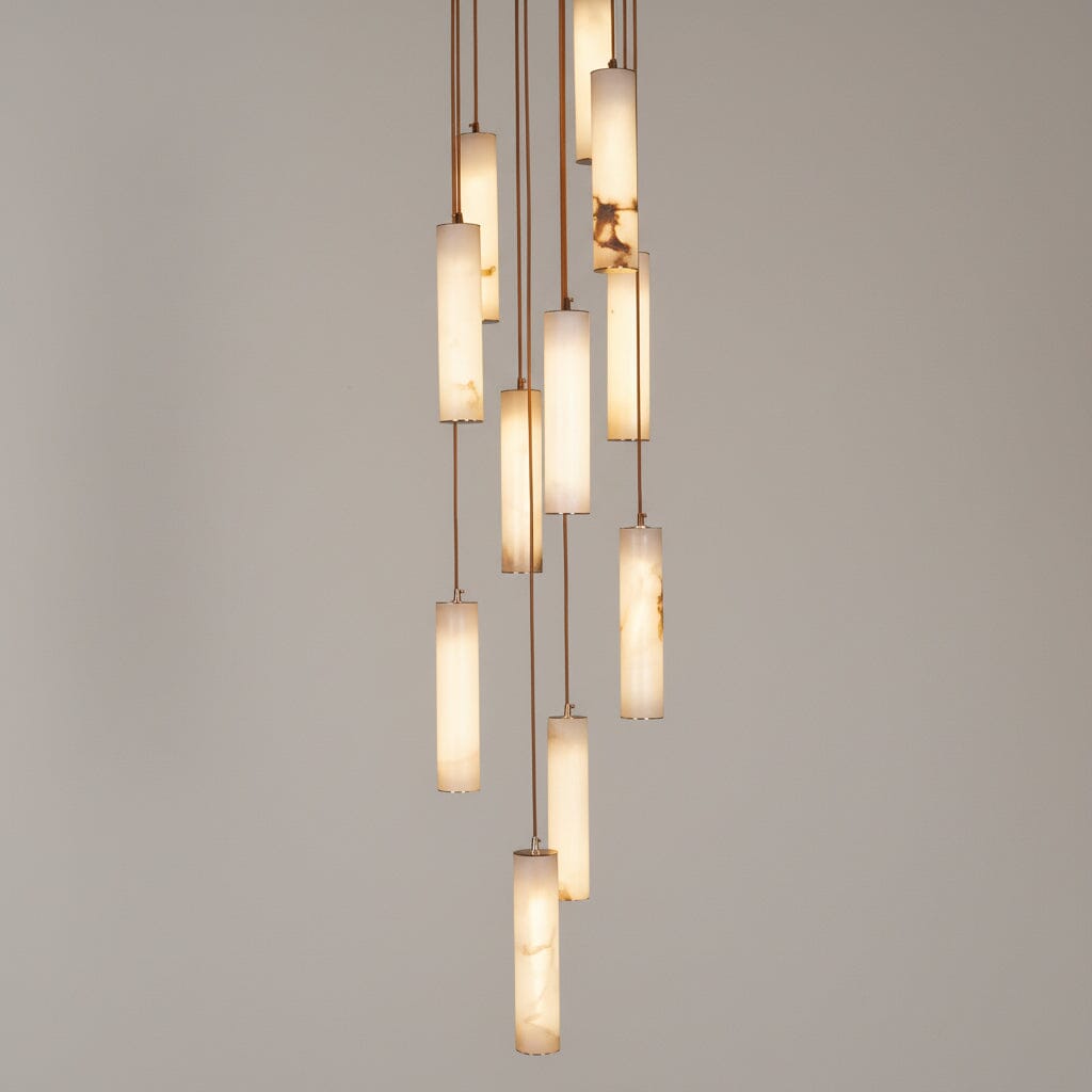 Modern pendant light with glass shades on a gray background