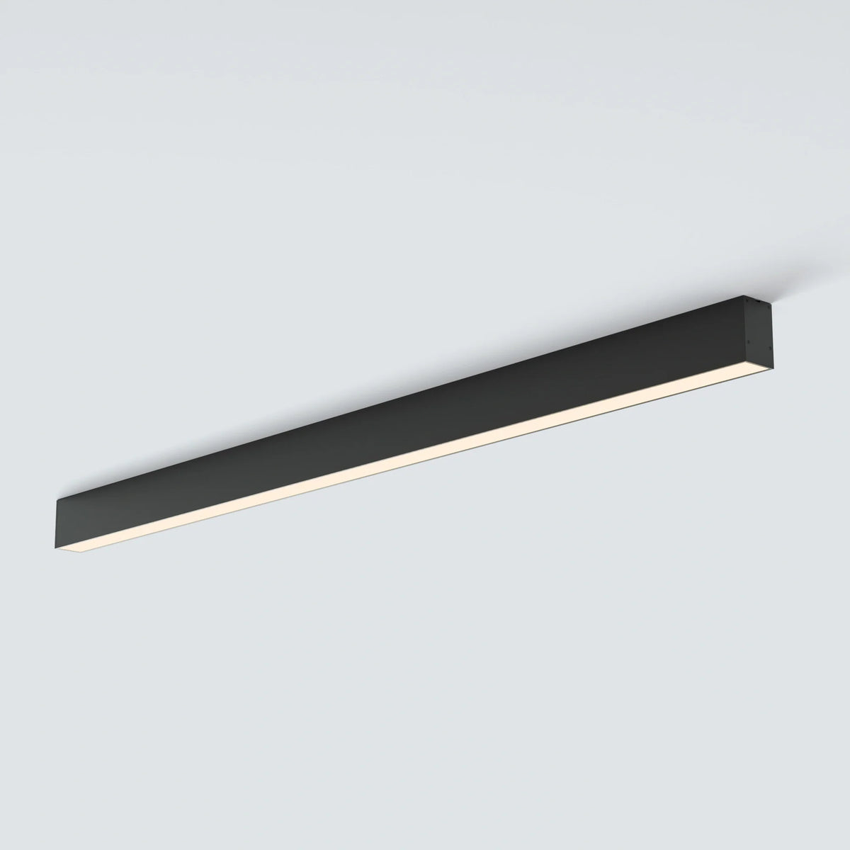 Two slim LUNIVA ceiling bars lighting a bright neutral living room.