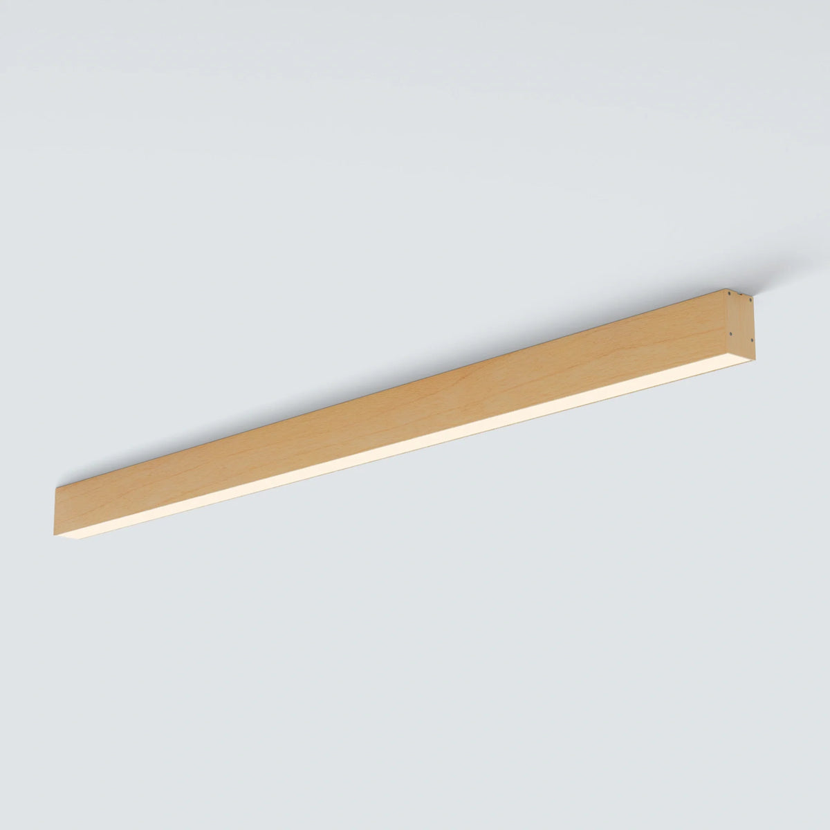 Multiple LUNIVA linear lights forming an open geometric layout beneath a wood ceiling.