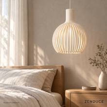 ABODE white pendant beside an oak bed in a warm neutral bedroom, illustrative visualisation