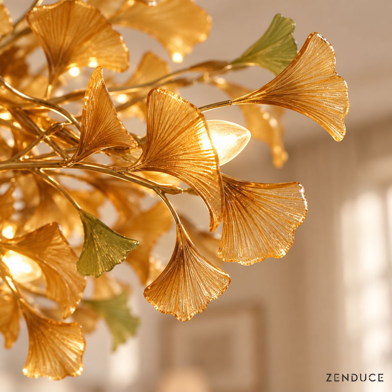 Close-up of ALUNA Coffee ginkgo glass leaves, ribbed texture and warm light