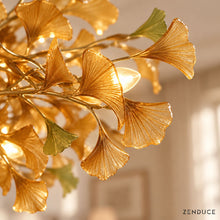 Close-up of ALUNA Coffee ginkgo glass leaves, ribbed texture and warm light