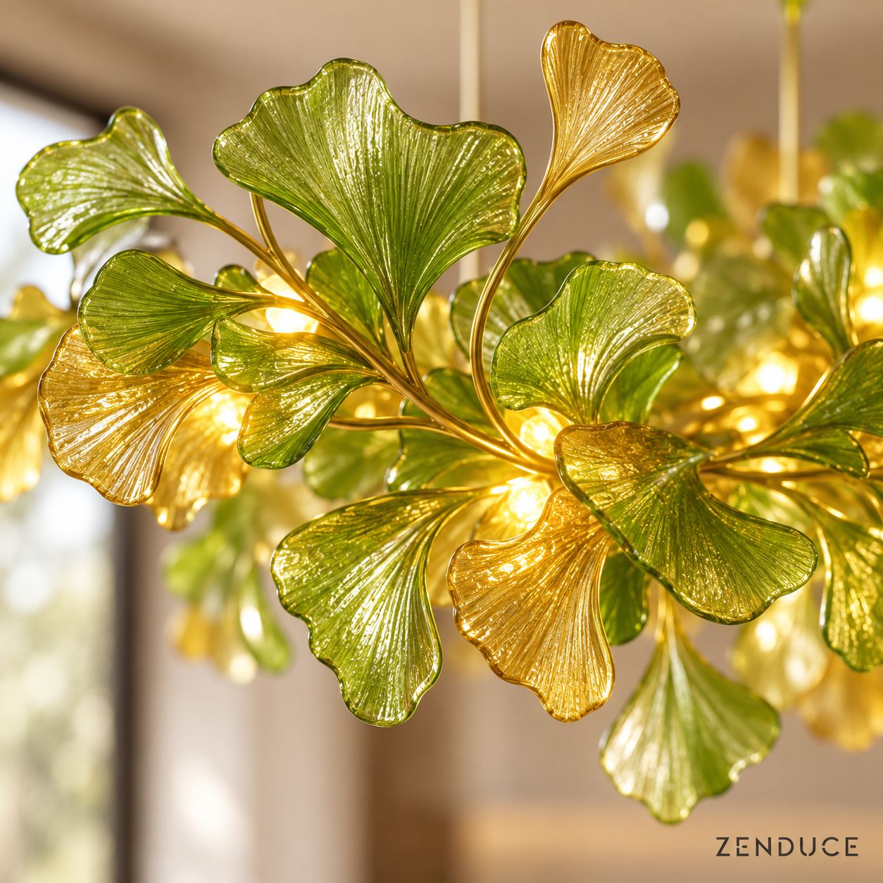Close-up of ALUNA Green ribbed ginkgo glass leaves and fine gold-finished branches