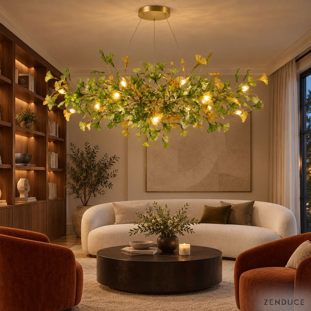 ALUNA Round Green chandelier in a lounge with walnut bookshelves and velvet chairs