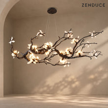ALVIA black copper branch chandelier with natural stone blossoms on a mushroom taupe background