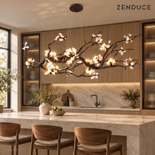 ALVIA chandelier visualization over a stone kitchen island with walnut stools