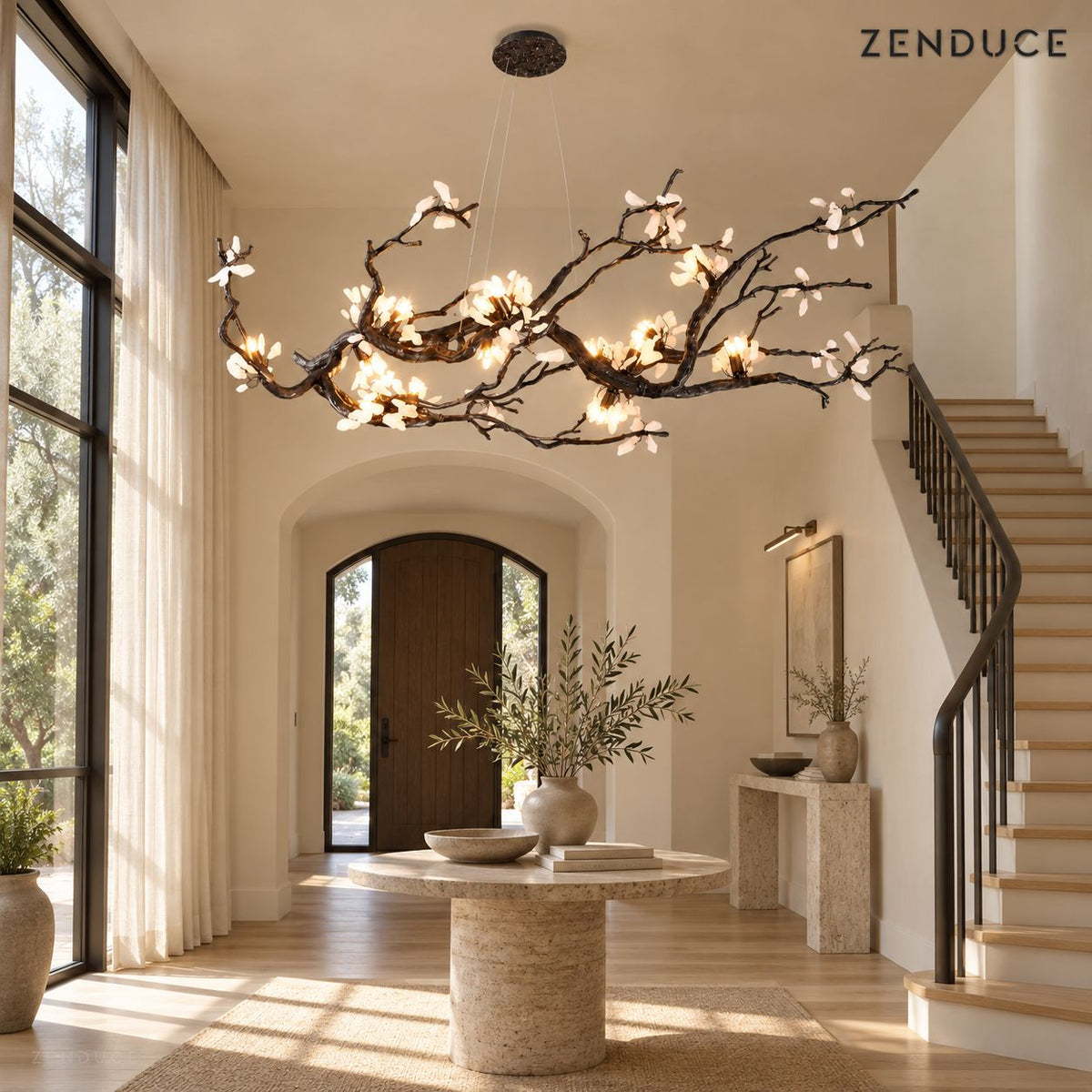 ALVIA chandelier visualization in a bright foyer with an oak staircase