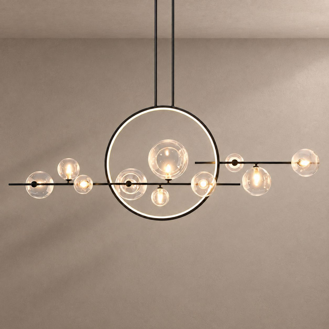 ARCHIPELAGO lighting with natural shadows against a mushroom taupe background