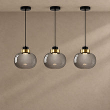 ASHTON lighting on a mushroom taupe background with natural shadows