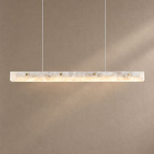 AURALIS lighting on a mushroom taupe background with natural shadows