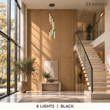 AVELLE 8 Lights in black in a photorealistic staircase setting, with oak walls, limestone steps and Zenduce branding