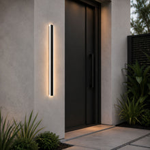 Short Bolt Light Sensor beside a contemporary side entrance