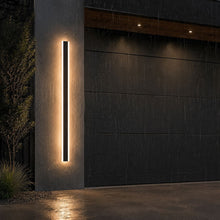 Bolt Light Sensor illuminating a garage entrance in the rain
