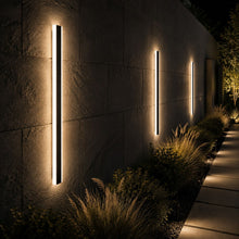 Bolt Light Sensor fixtures lighting a landscaped walkway