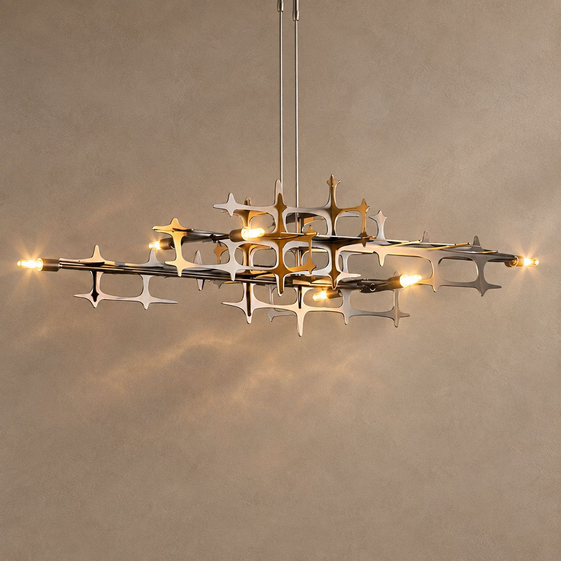 BRILLA lighting on a mushroom taupe background with natural shadows