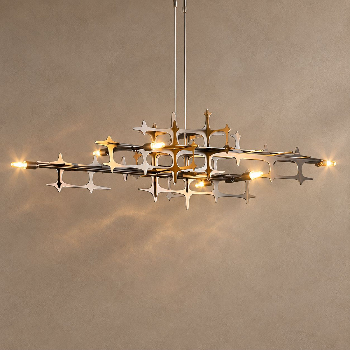 BRILLA lighting on a mushroom taupe background with natural shadows