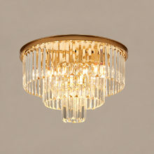 CAPRIEL gold three-tier crystal ceiling light on a mushroom taupe background