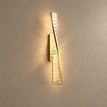 CHARIS (WALL LAMP) lighting on a mushroom taupe background with natural shadows