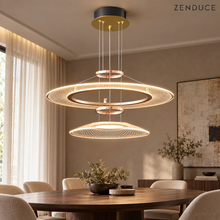 CIRCA double-tier gold lattice chandelier above a walnut dining table