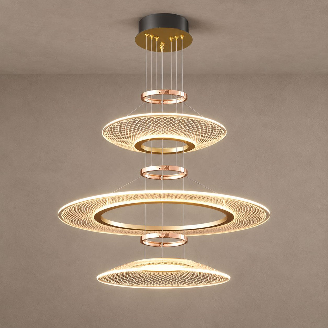 CIRCA three-tier gold lattice chandelier on mushroom taupe plaster with natural shadows