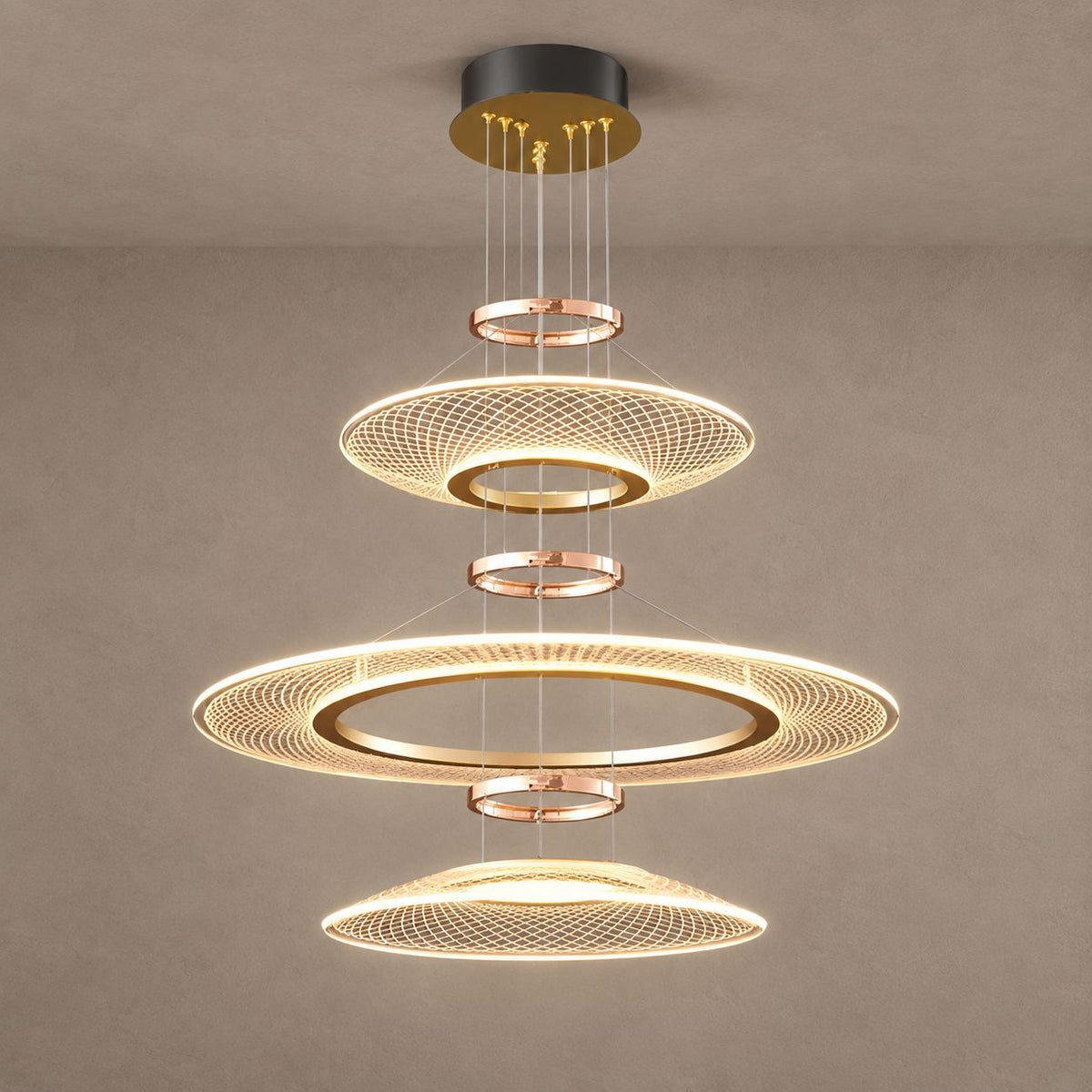 CIRCA three-tier gold lattice chandelier on mushroom taupe plaster with natural shadows