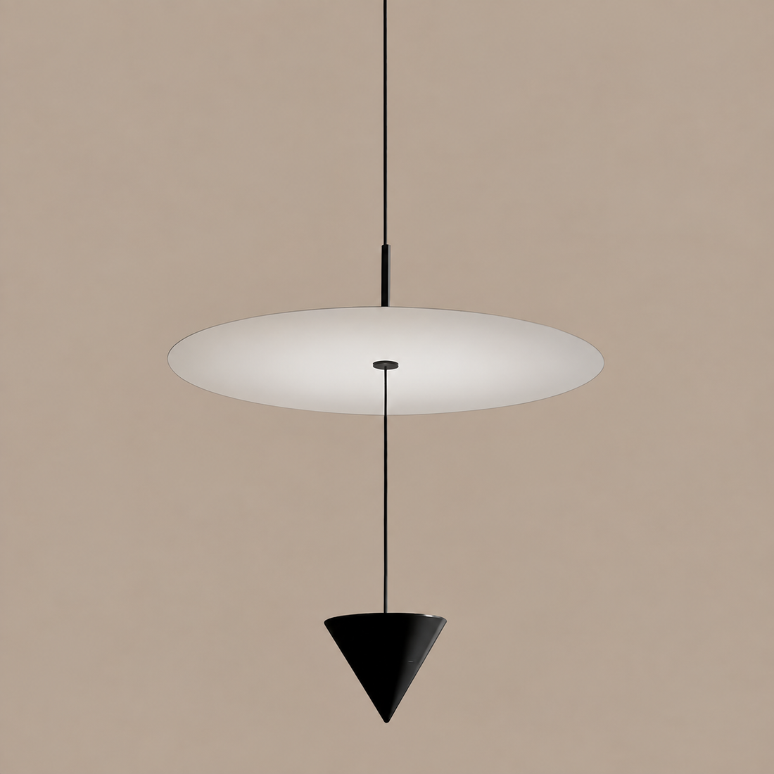 CONIA white disc and suspended black cone pendant on a mushroom taupe background