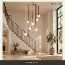 CORIA 7-light Red leather and opal glass chandelier in the shared staircase setting, showing an illustrative adjustable suspension arrangement