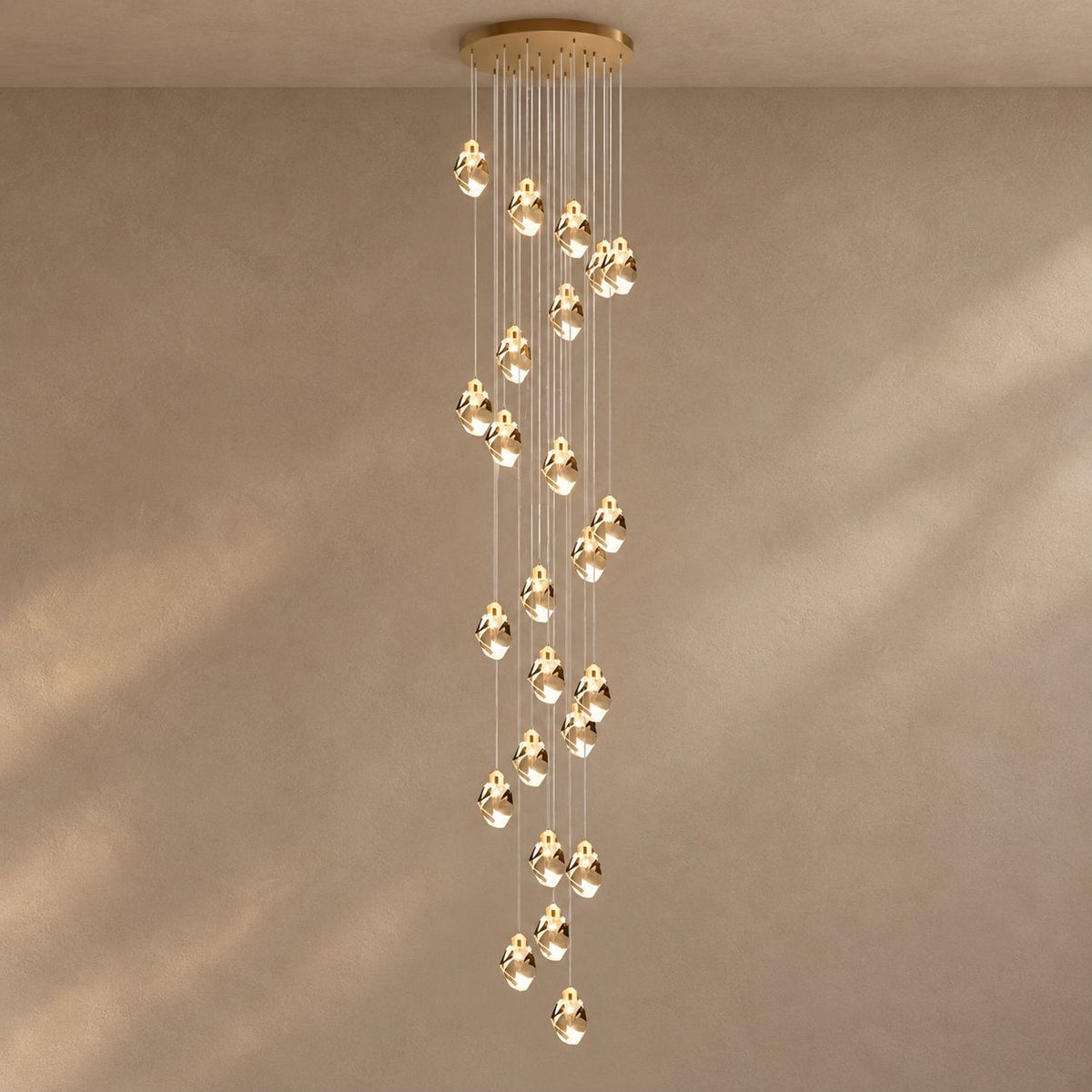 CRYSTAL ROCK (GRAND) (Open Box) lighting on a mushroom taupe background with natural shadows
