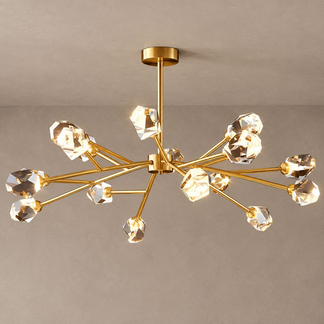 CRYSTAL ROCK semi-flush gold chandelier with faceted crystal heads against mushroom taupe plaster and natural shadows