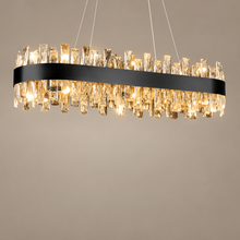 CRYSTORA oval crystal chandelier on a mushroom taupe background