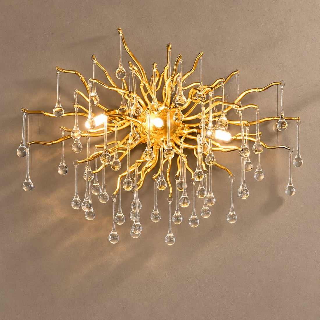 DRIBBLE (Wall) lighting on a mushroom taupe background with natural shadows