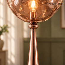 ELUNE Rose Gold close-up showing the lower acrylic shade, rounded metal collar and tapered pedestal