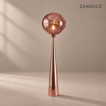 ELUNE Rose Gold acrylic floor lamp with matching reflective conical pedestal and natural shadow