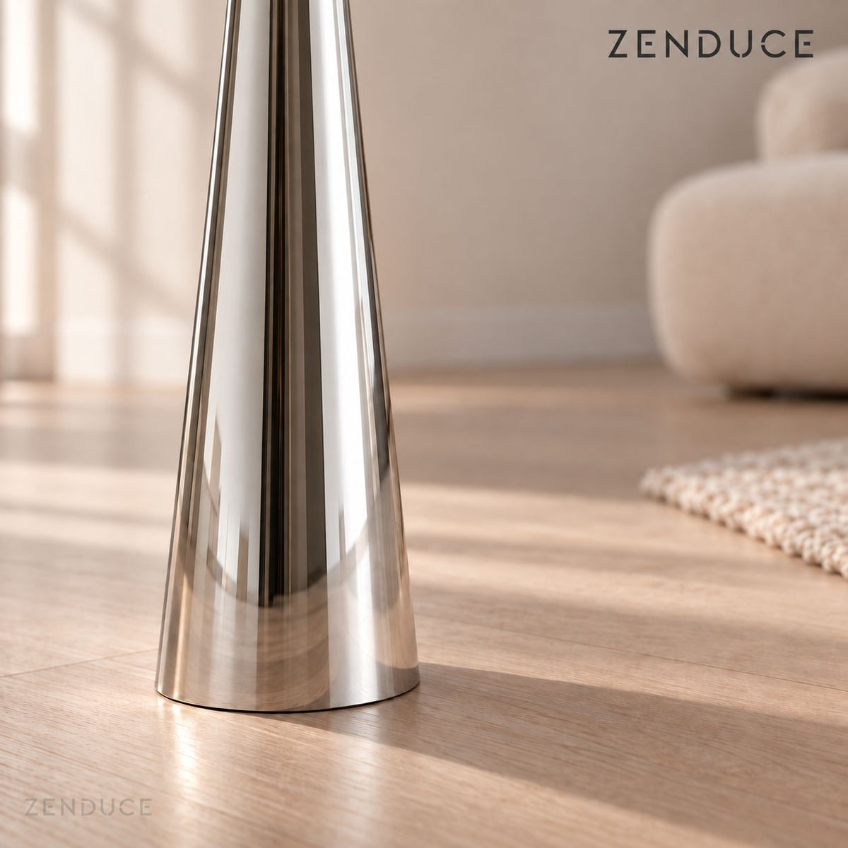LAVA FLOOR Chrome Silver close-up showing the polished stainless steel conical pedestal and floor contact