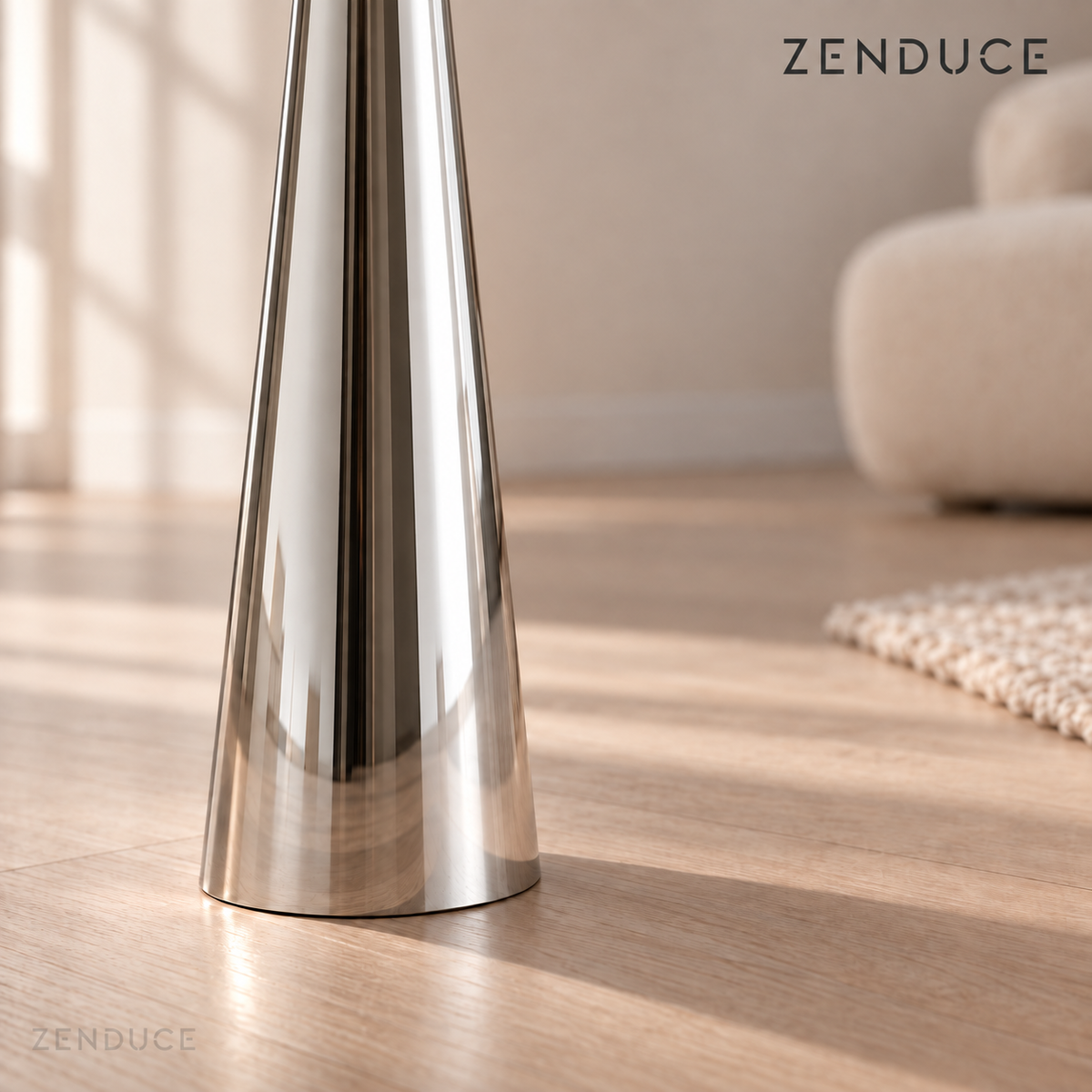 ELUNE Chrome Silver close-up showing the polished stainless steel conical pedestal and floor contact